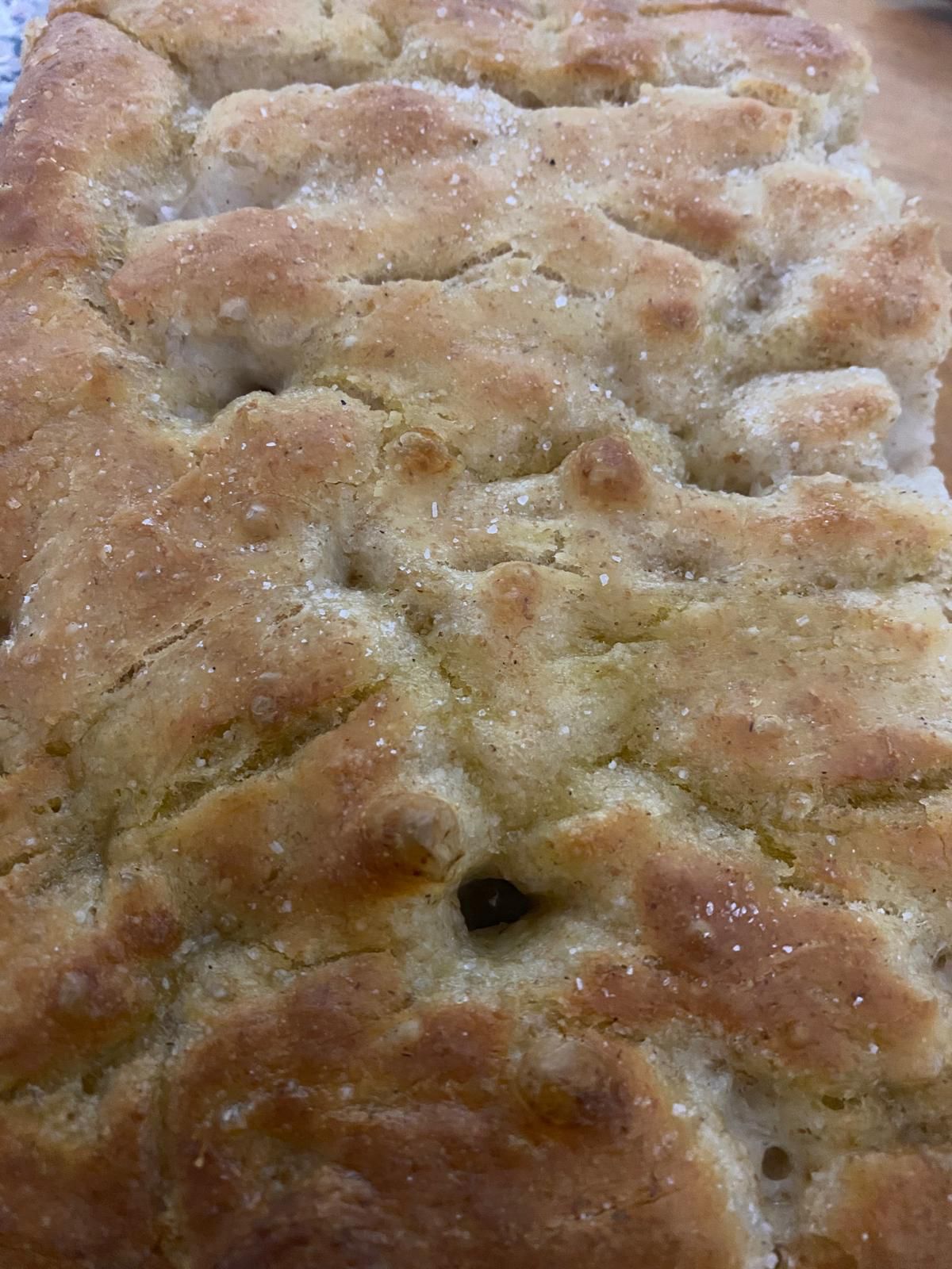 golden focaccia bread crusty dimples
